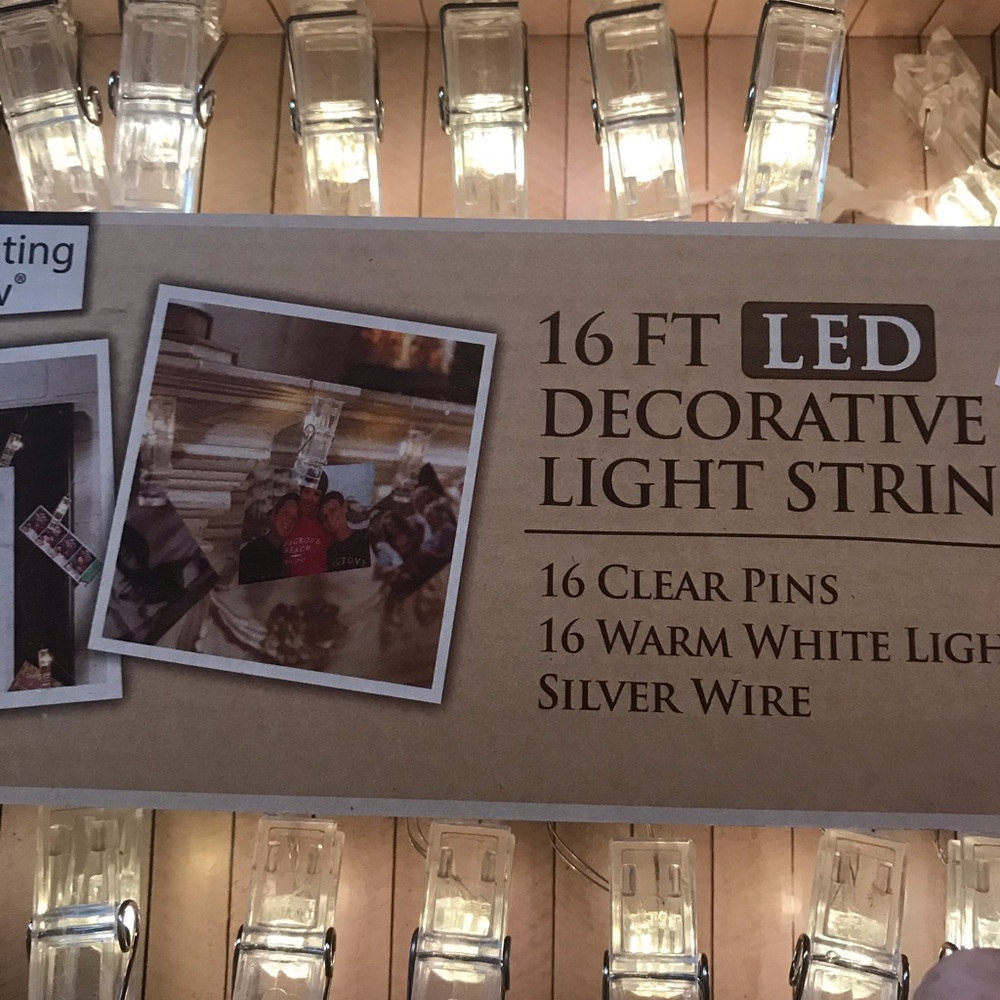 2 boxes of light up picture clips.